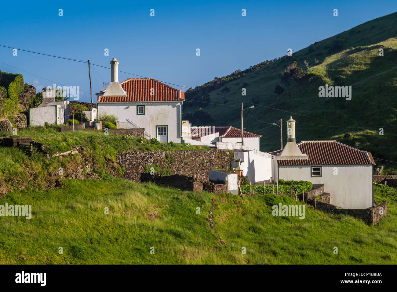 Portugal, Azores, Santa Maria Island, Malbusca, elevated village view Stock Photo