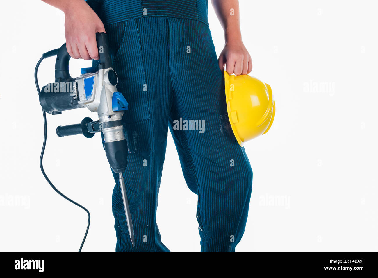 Handyman standing isolated on white in studio Stock Photo