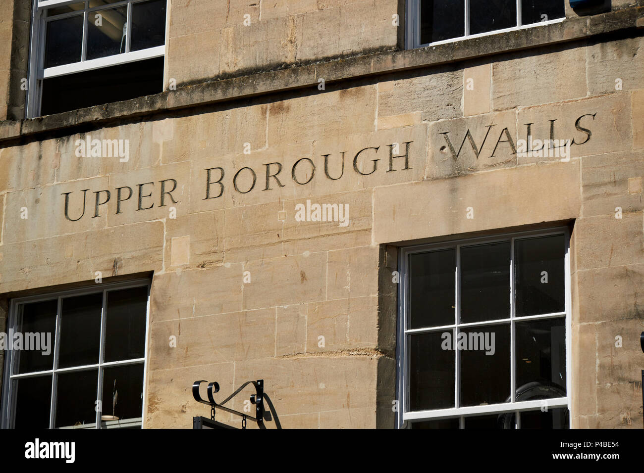 upper borough walls sign carved into old bath stone wall Bath England UK Stock Photo