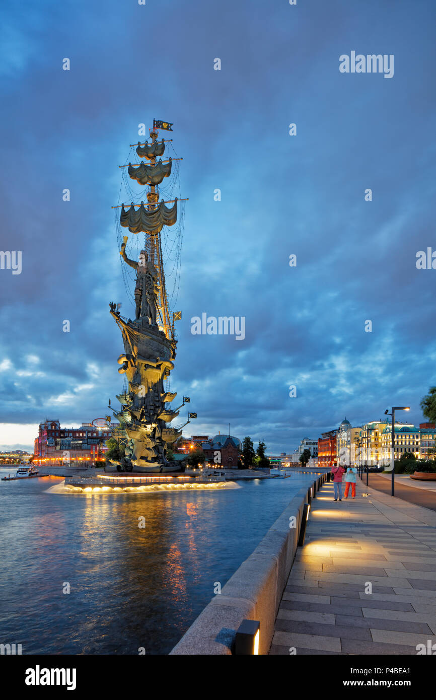 Peter the Great Statue, a 98-metre-high monument to Russian Tsar Peter I, illuminated at dusk. Krymskaya Embankment, Moscow, Russia. Stock Photo