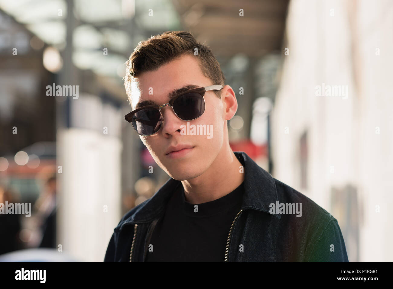 Boy wearing sunglasses outdoors hi-res stock photography and images - Alamy