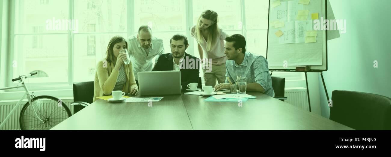 Serious worker brainstorming together Stock Photo