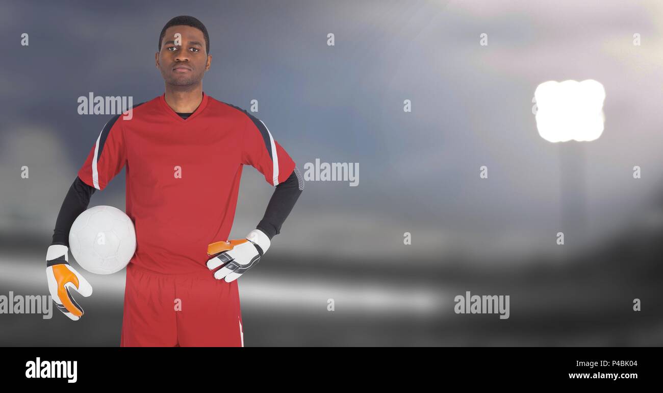 Soccer goalkeeper holding ball in goal Stock Photo Alamy