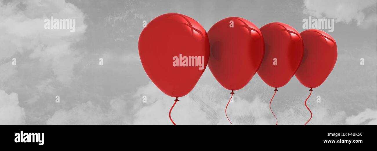 Red balloons on grey sky background Stock Photo