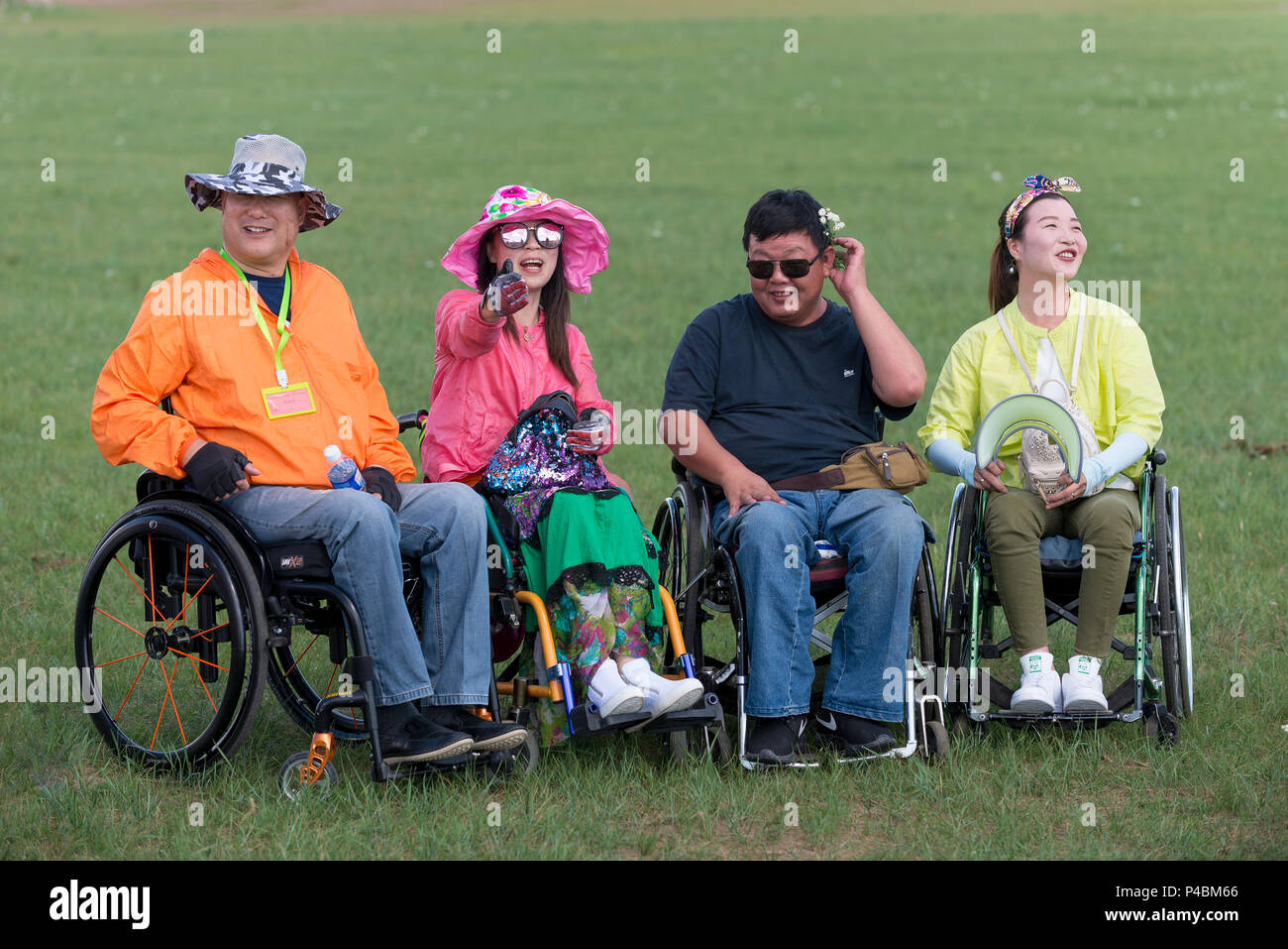 Wheelchair bound disabled Chinese tourists at Mongolian Khan City