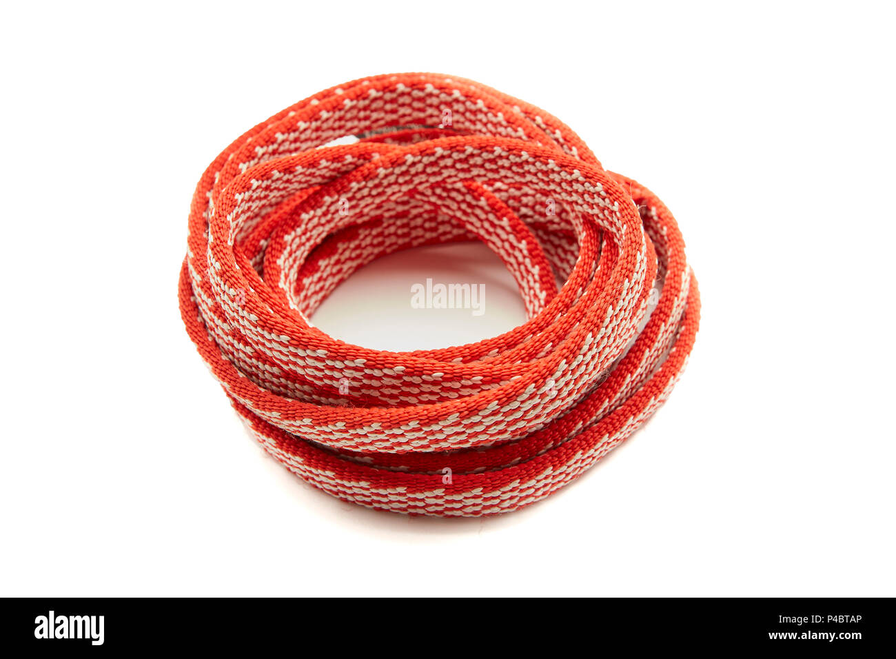 One Red Rope, Coiled in a spiral Stock Photo