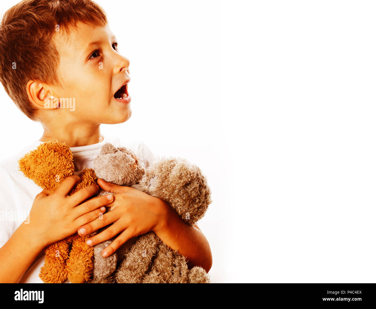 little cute boy with many teddy bears hugging isolated on white ...