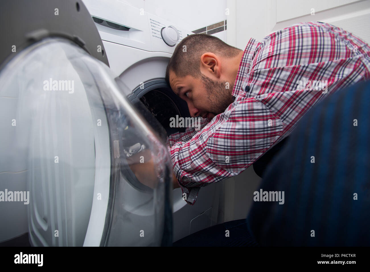 Washing Machine Repair High Resolution Stock Photography and Images Alamy