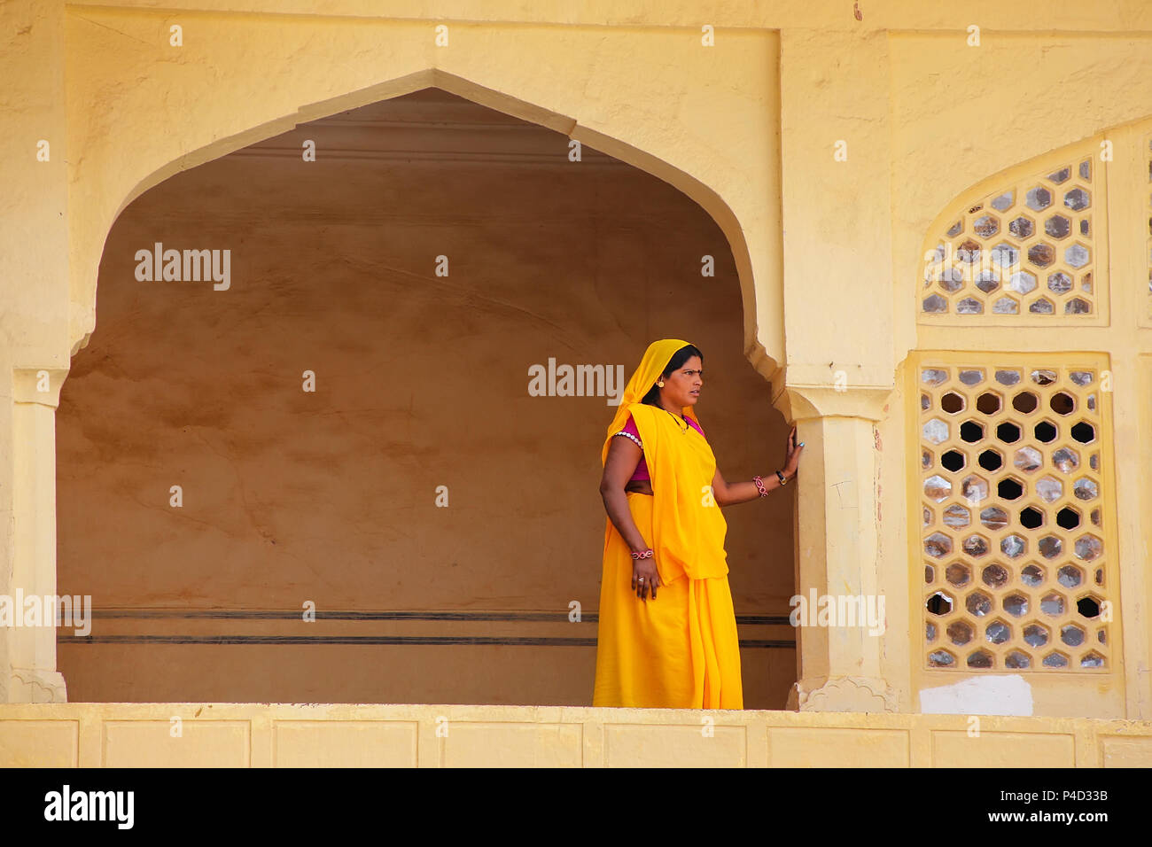 Indian woman standing in balcony hi-res stock photography and images ...