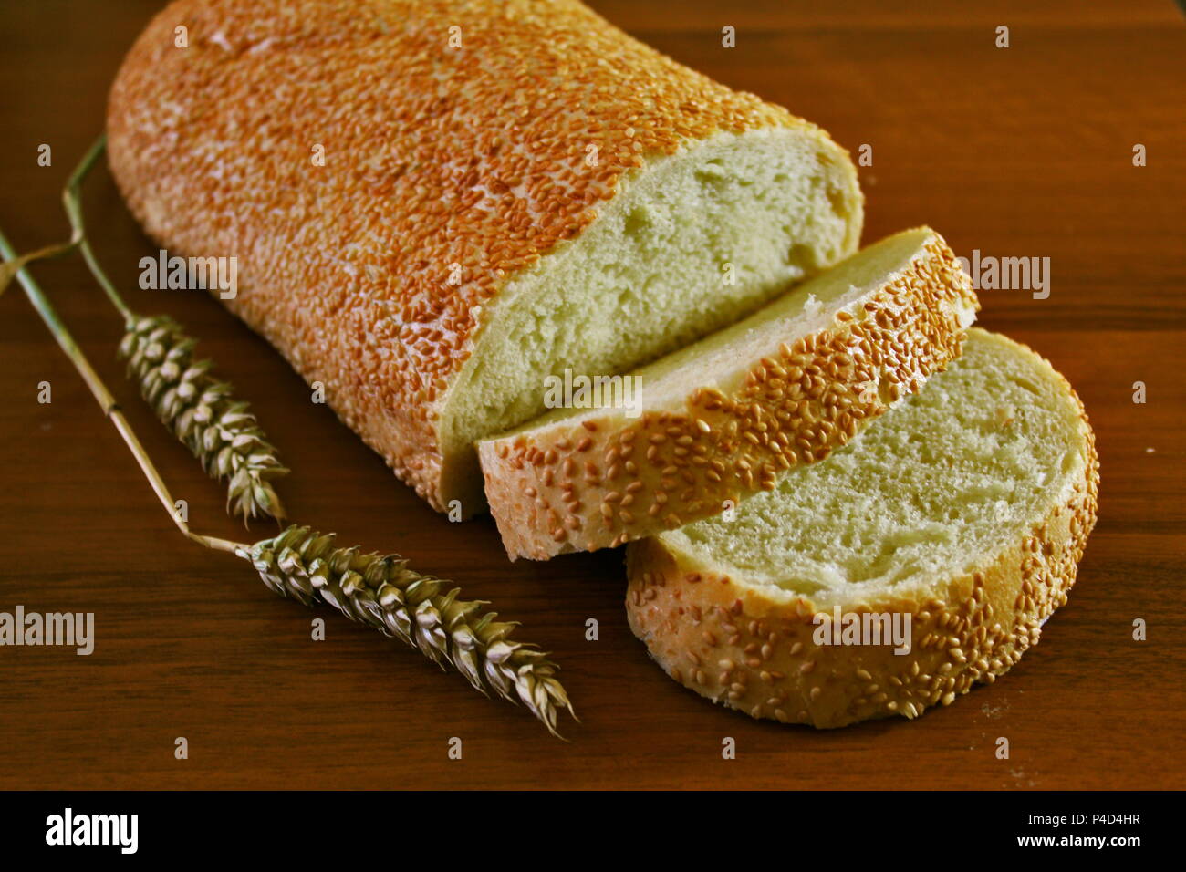 Whole grain bread in the table Stock Photo - Alamy