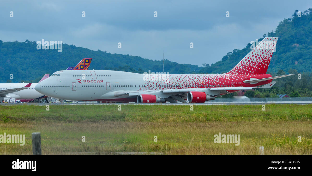 Phuket, Thailand - Apr 25, 2018. A Boeing 747-400 airplane of Rossiya Airlines taxiing on runway in Phuket International Airport (HKT). Stock Photo