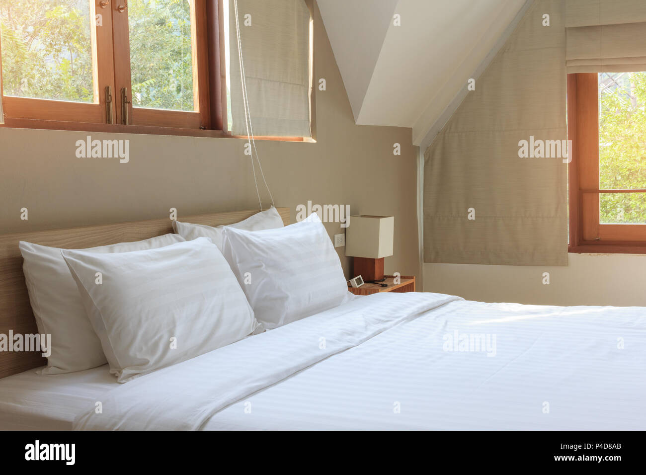 Vintage Bedroom Interior With New White Bed And Pillow At