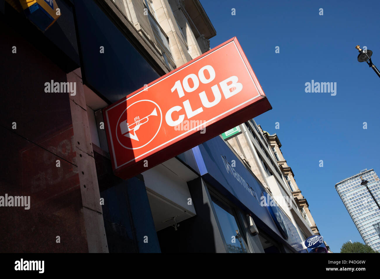 Sign for the famous 100 Club music venue in London, England, United Kingdom. The 100 Club is a live music venue located at 100 Oxford Street, which has been hosting live music since 24 October 1942. It was originally called the Feldman Swing Club, but changed its name when the father of the current owner took over in 1964. Stock Photo