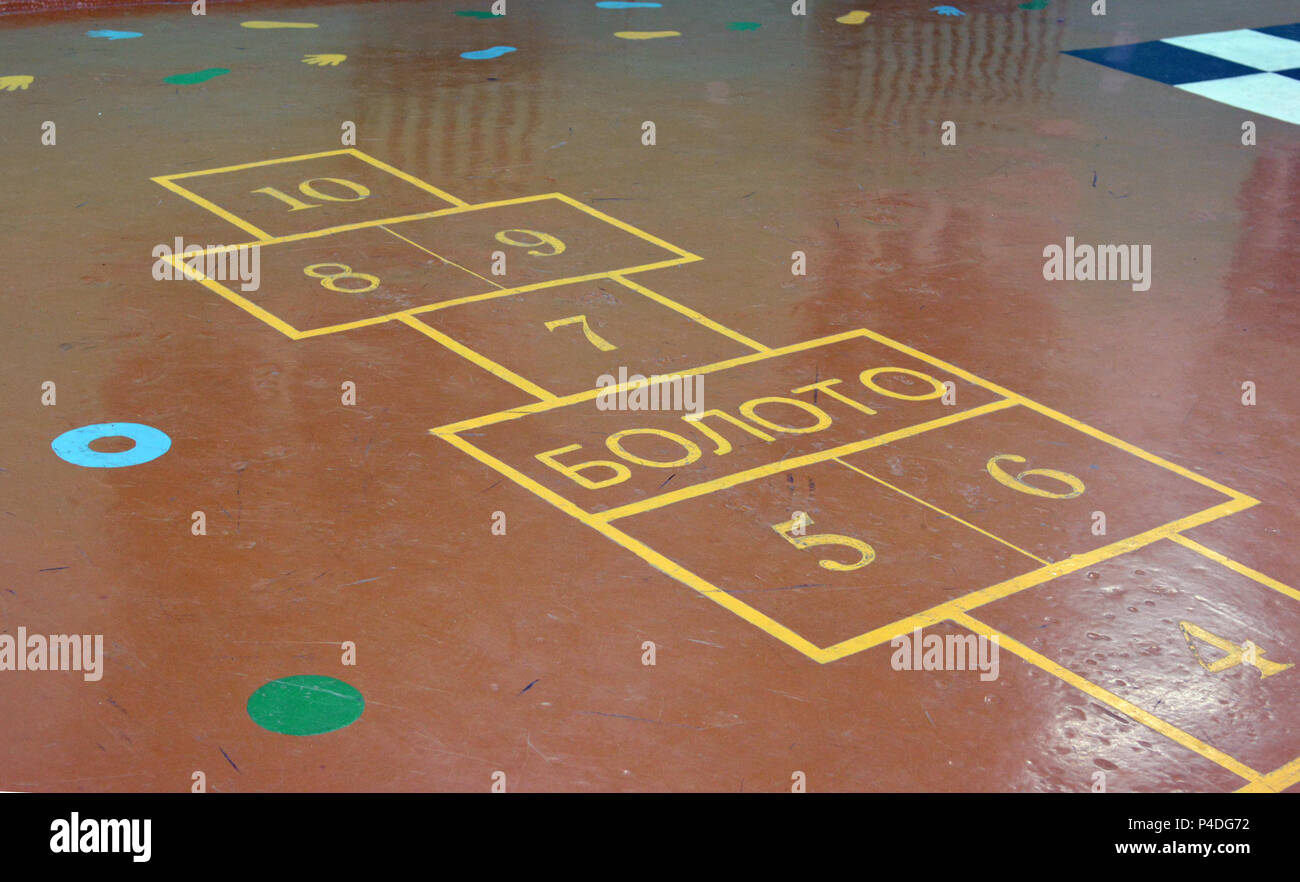 Children's classic game painted on the floor in the corridor Stock