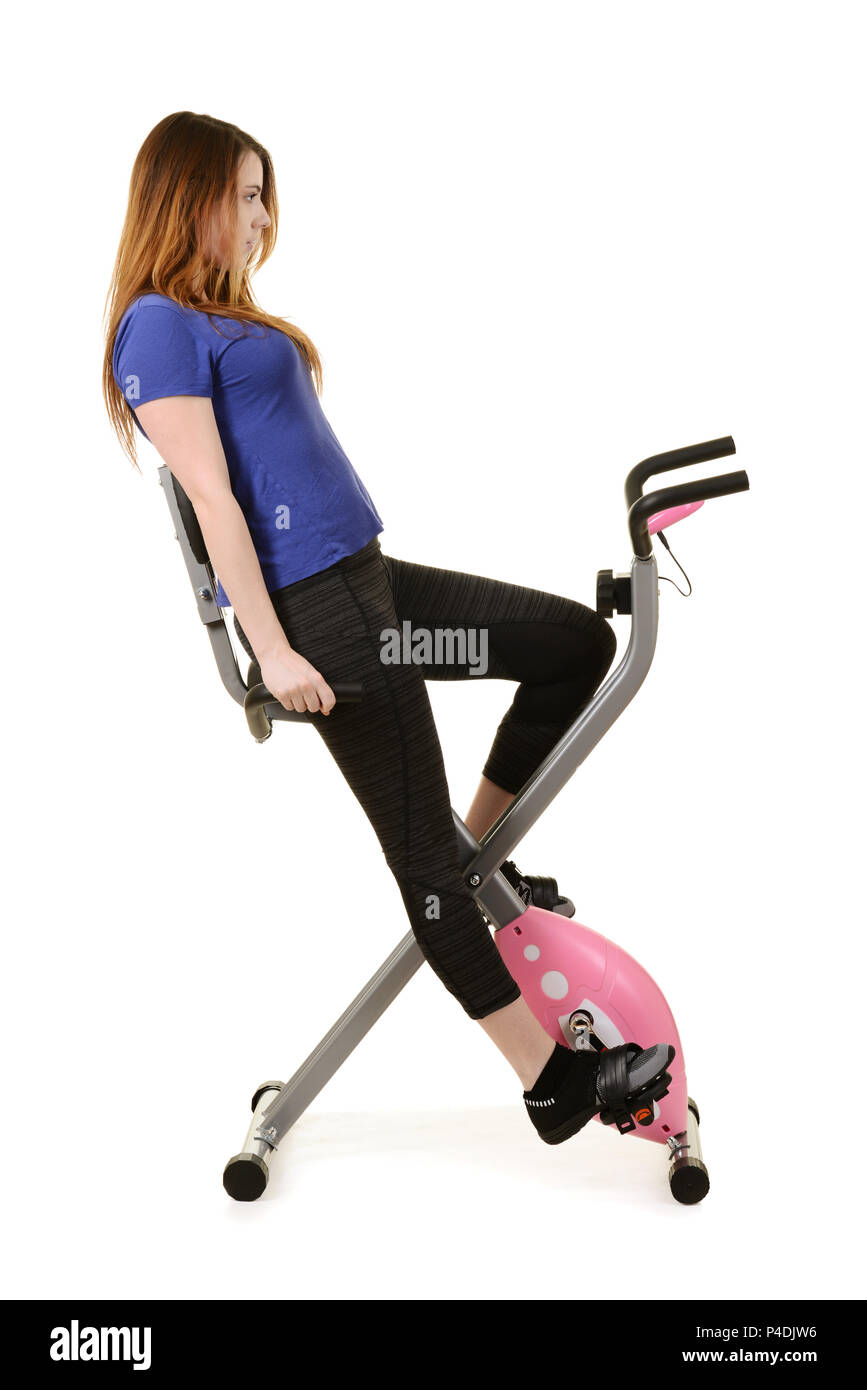 woman doing cardio on an exercise bike Stock Photo Alamy