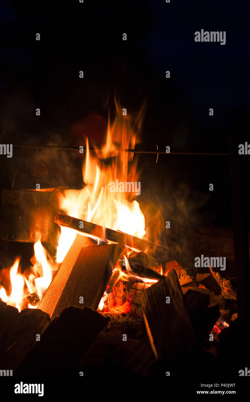 bonfire burns at night Stock Photo