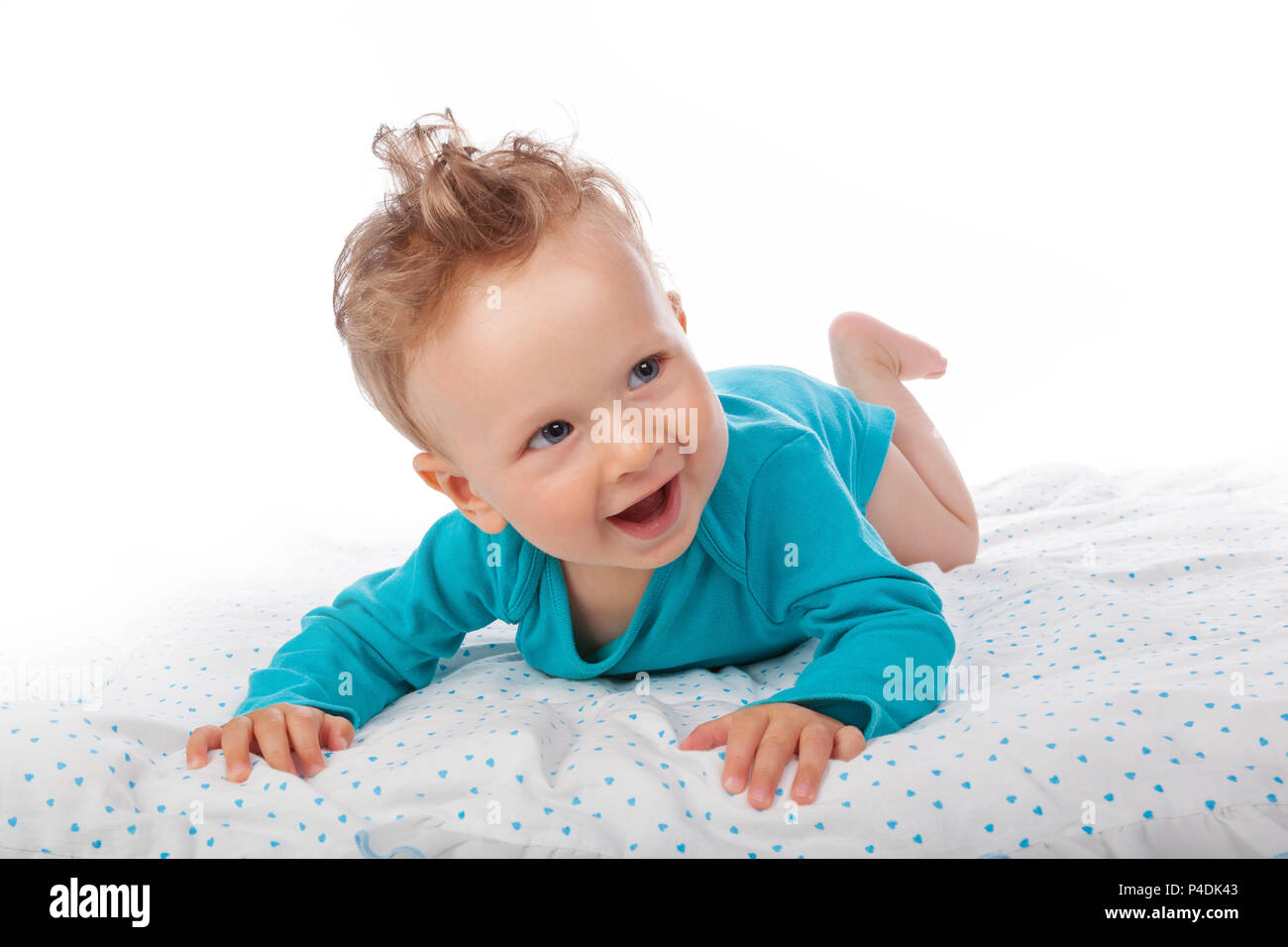 Beautiful baby boy with heterochromia iridum isolated on white background. Stock Photo