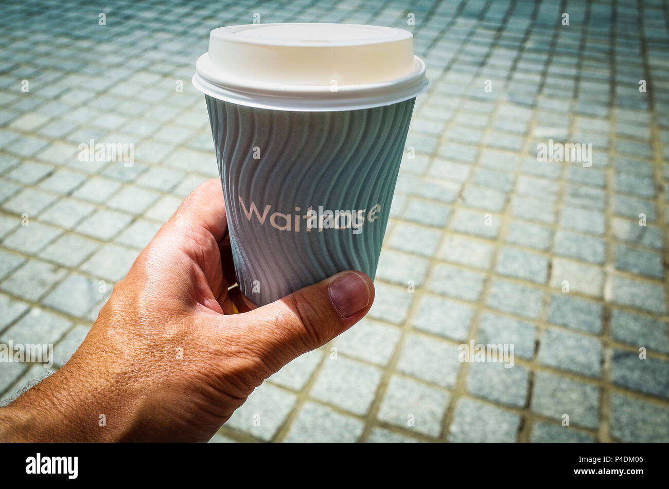 A Waitrose Complementary Coffee Cup - the cups are being phased out, customers will need reusable cups in future Stock Photo