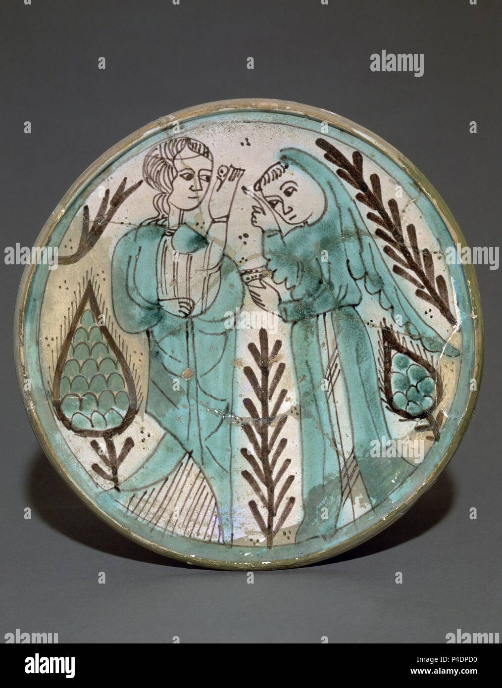 PLATO DE LA DAMA Y EL MONJE CERAMICA DE PATERNA SIGLO XIV. Location