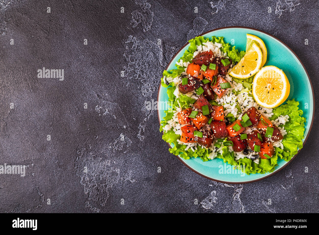 Poke, traditional Hawaiian raw fish salad, top view Stock Photo Alamy