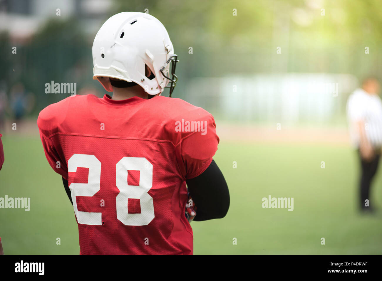 Picture of an American Football player standing Stock Photo
