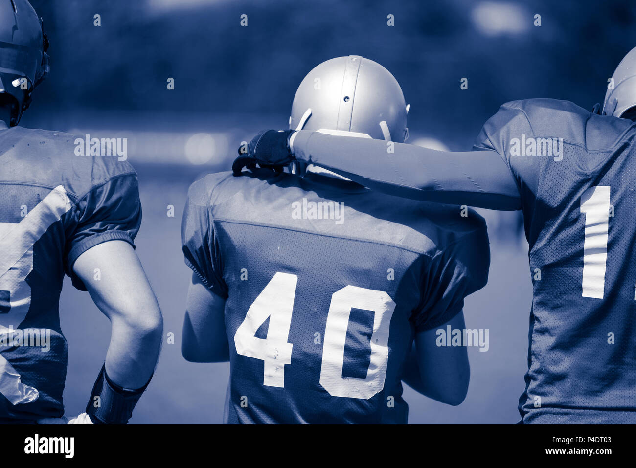 Duo toned image of American Football players in action Stock Photo