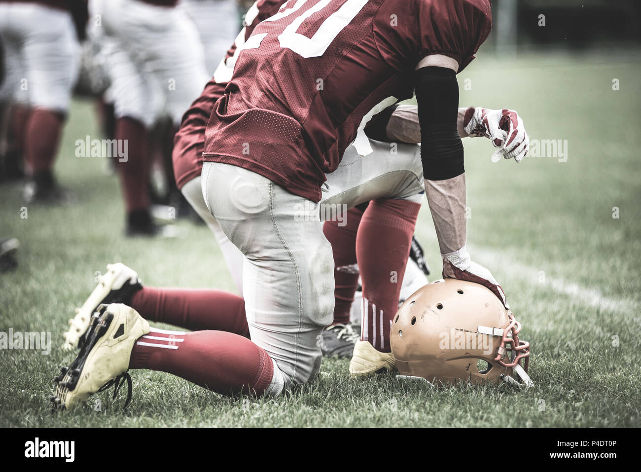 Toned image of an American Football player in action Stock Photo