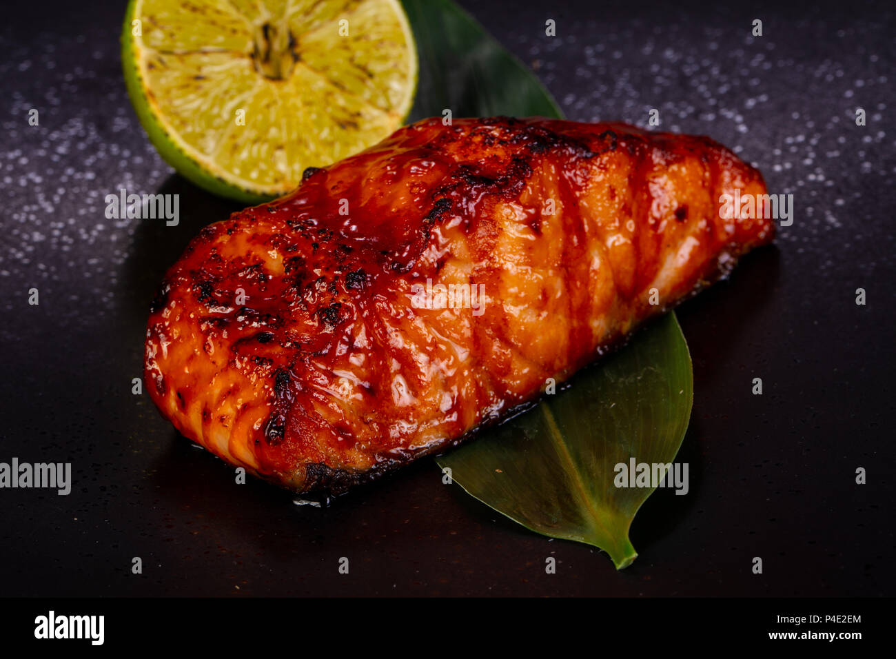 Grilled salmon fillet with lemon Stock Photo - Alamy