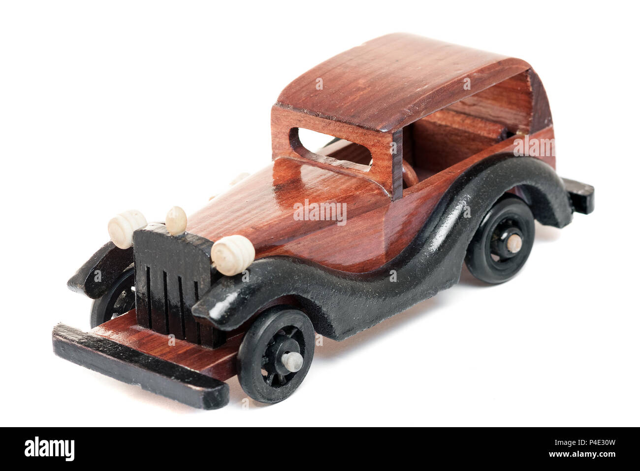 Vintage wooden toy car isolated from background Stock Photo