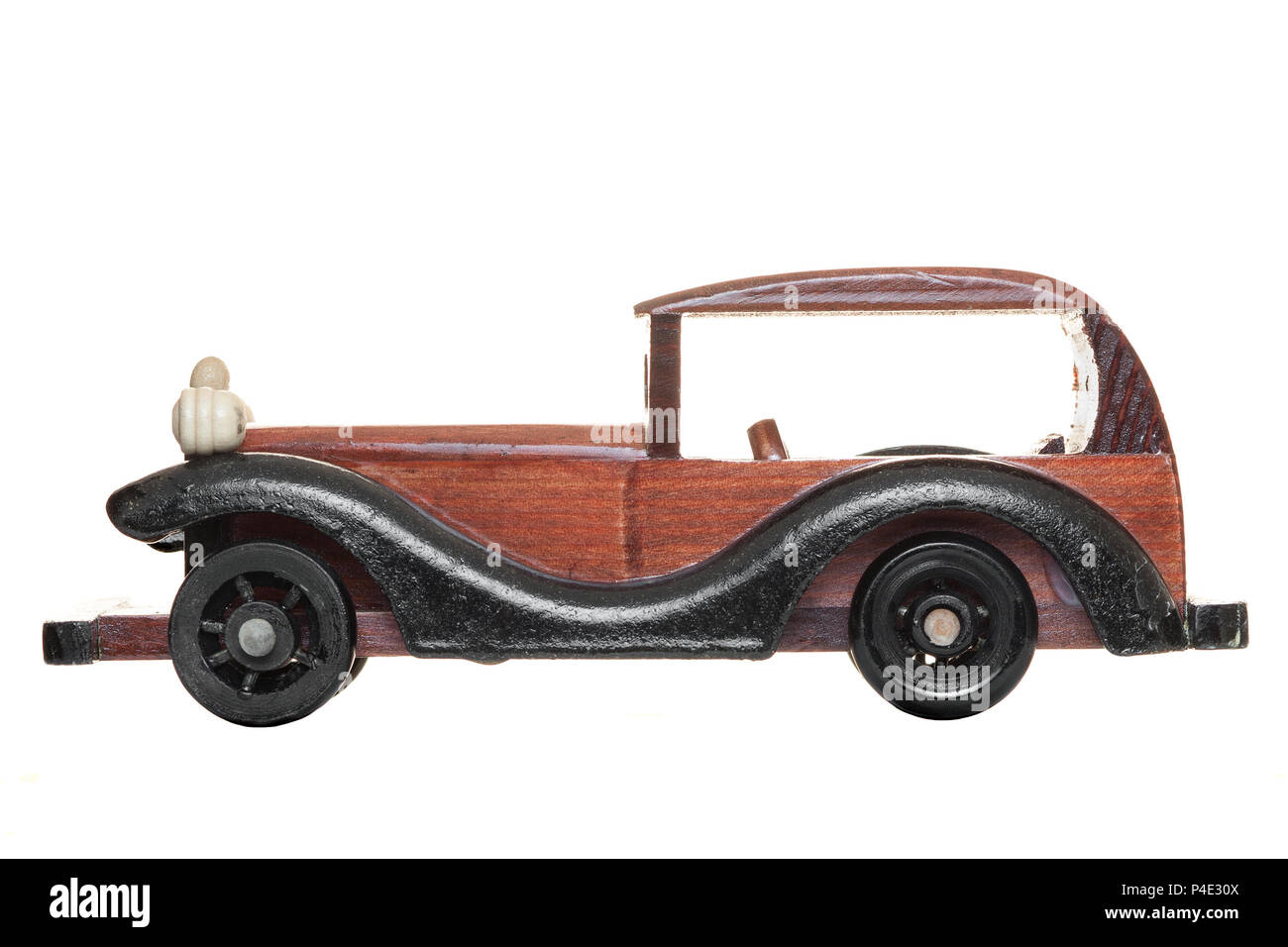 Vintage wooden toy car isolated from background Stock Photo