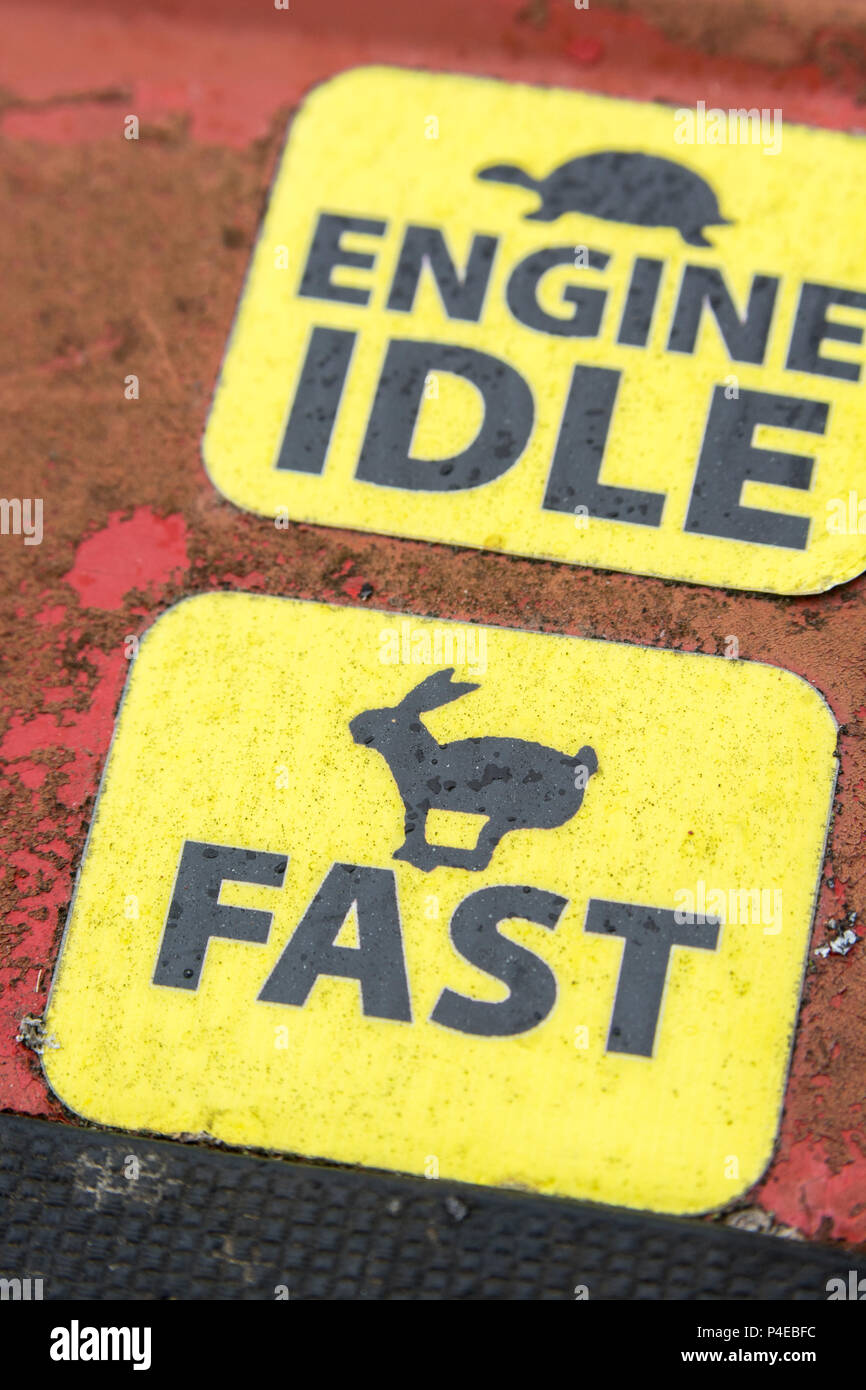 Engine management labels on tractor bodywork. Metaphor for tortoise and ...