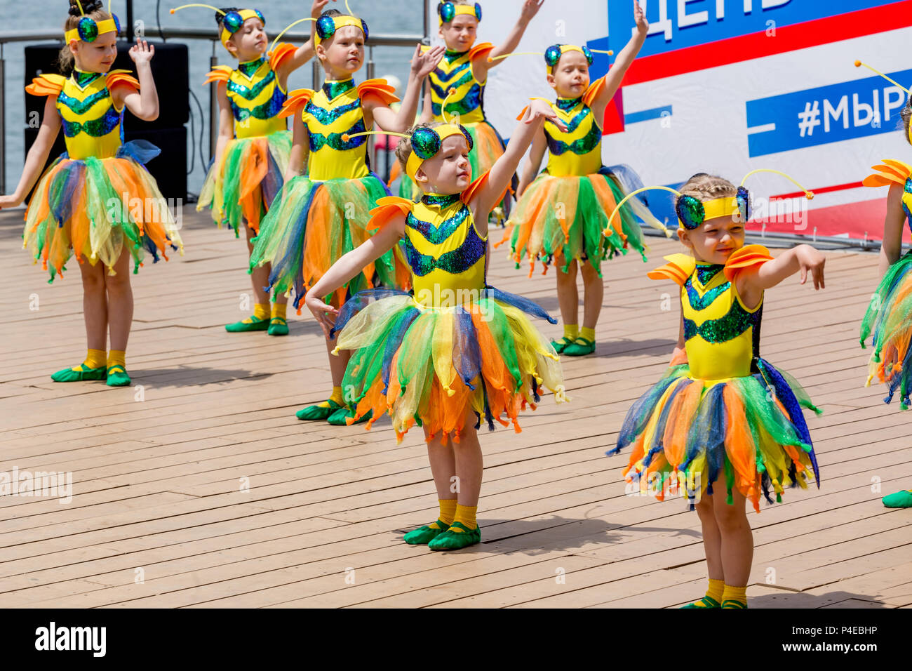 Russia Vladivostok 06 12 2018. Nice little girls in funny costumes of bees perform the dance on stage. Celebration of annual Russia Day on June 12 Stock Photo Alamy
