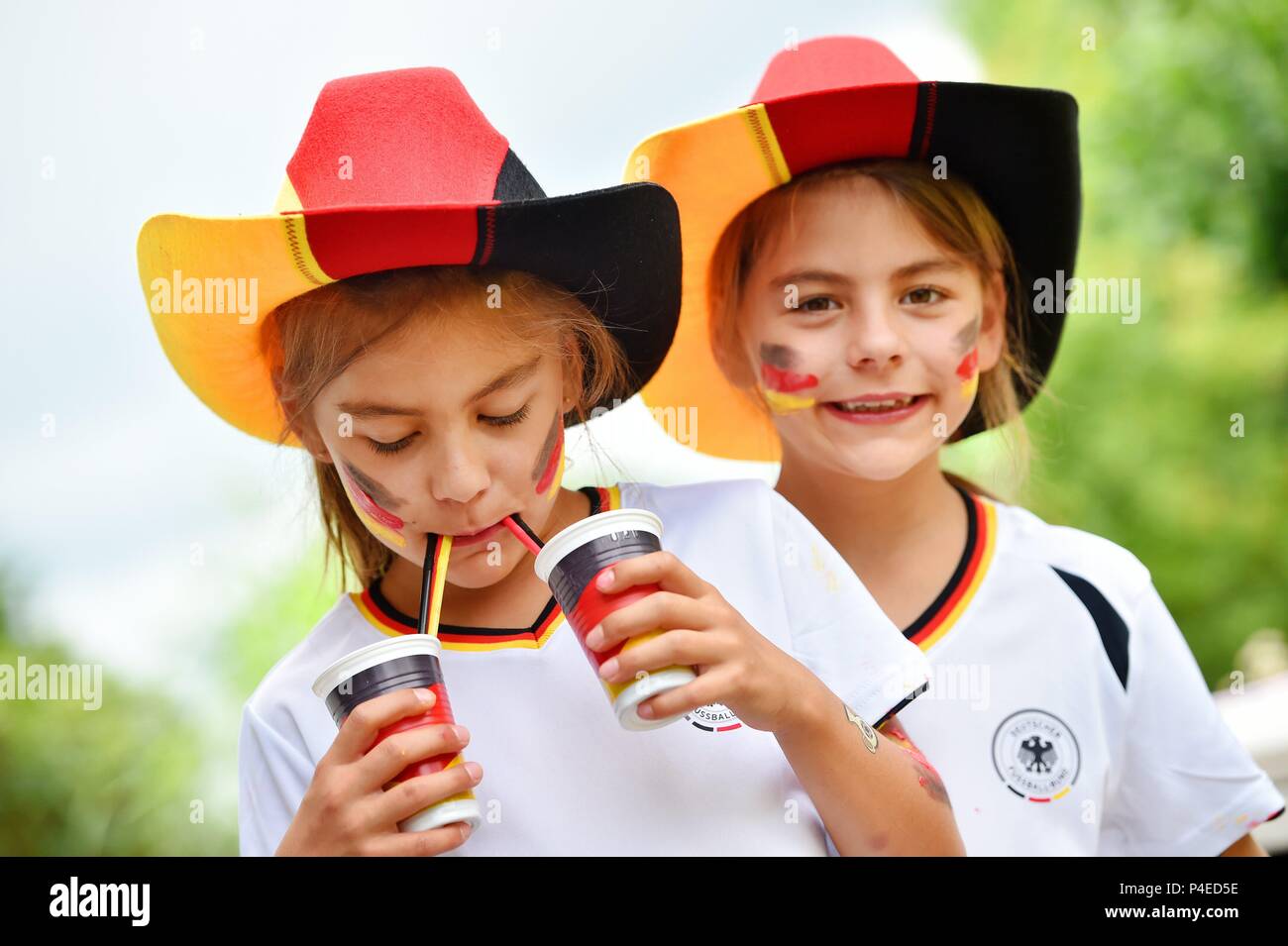 Illustration Two girls with soccer world cup merchandise, Germany