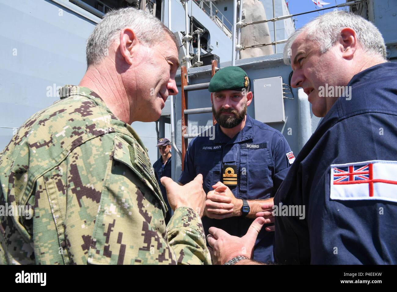 180617-N-TB177-0055 ARABIAN GULF (June 17, 2018) Vice Adm. Scott Stearney, commander of U.S. Naval Forces Central Command, U.S. 5th Fleet, Combined Maritime Forces, left, speaks with members of the Royal Navy aboard HMS Middleton during Mine Countermeasures Exercise (MCMEX) 18-2. The bilateral exercise enhances cooperation, mutual MCM capabilities and interoperability between the U.S. and U.K., demonstrating the shared commitment of ensuring unfettered operations of naval and support vessels, as well as commercial shipping movements, throughout the maritime domain. (U.S. Navy photo by Mass Com Stock Photo