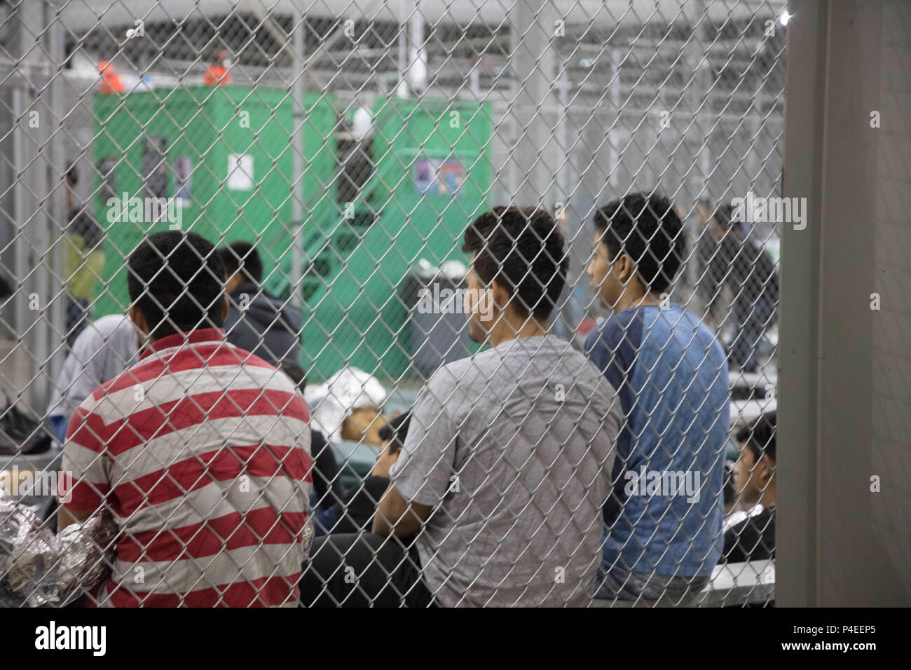 U.S. Border Patrol agents conduct intake of illegal border crossers at
