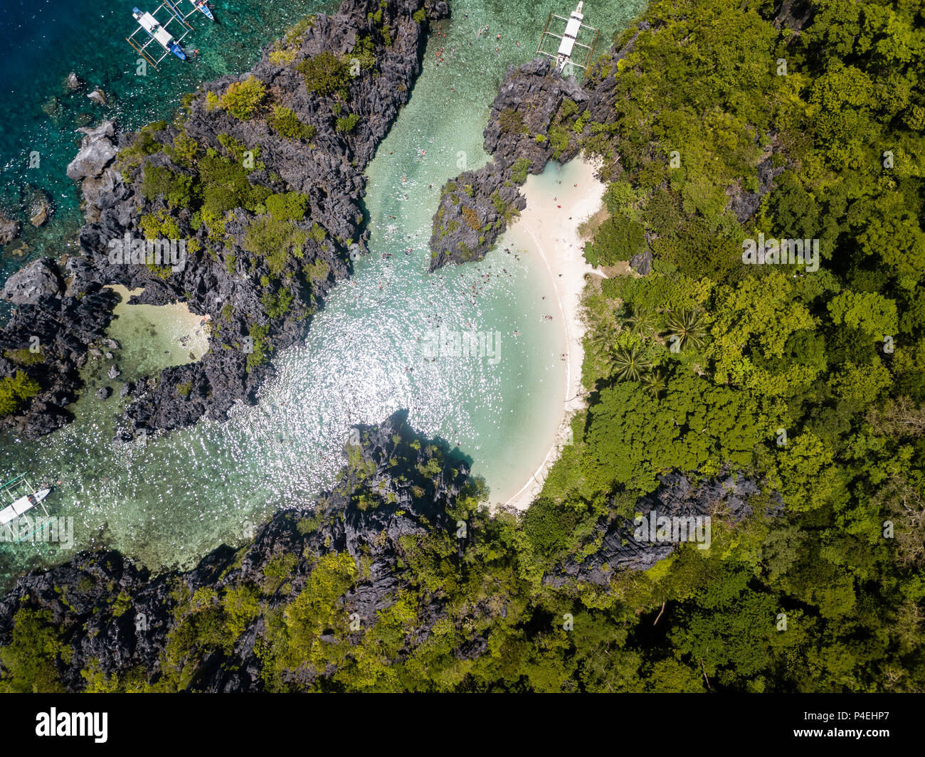 Top down drone view of the beautiful Hidden Beach and shallow lagoon in El Nido, Palawan Stock Photo