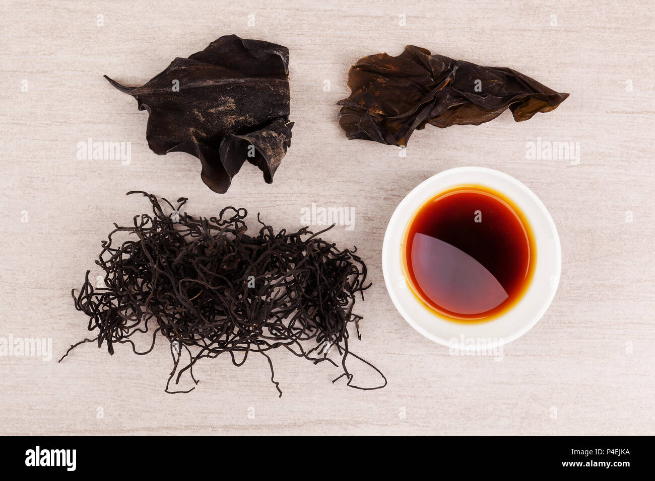 Traditional chinese medicine seaweed and Dan Shen on white background