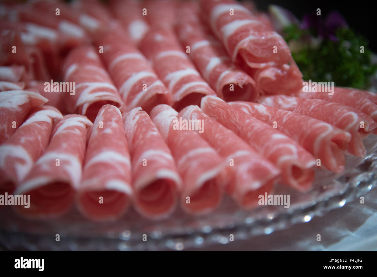 Rolls of raw beef mutton rolls beef meat ready to be cooked Stock Photo