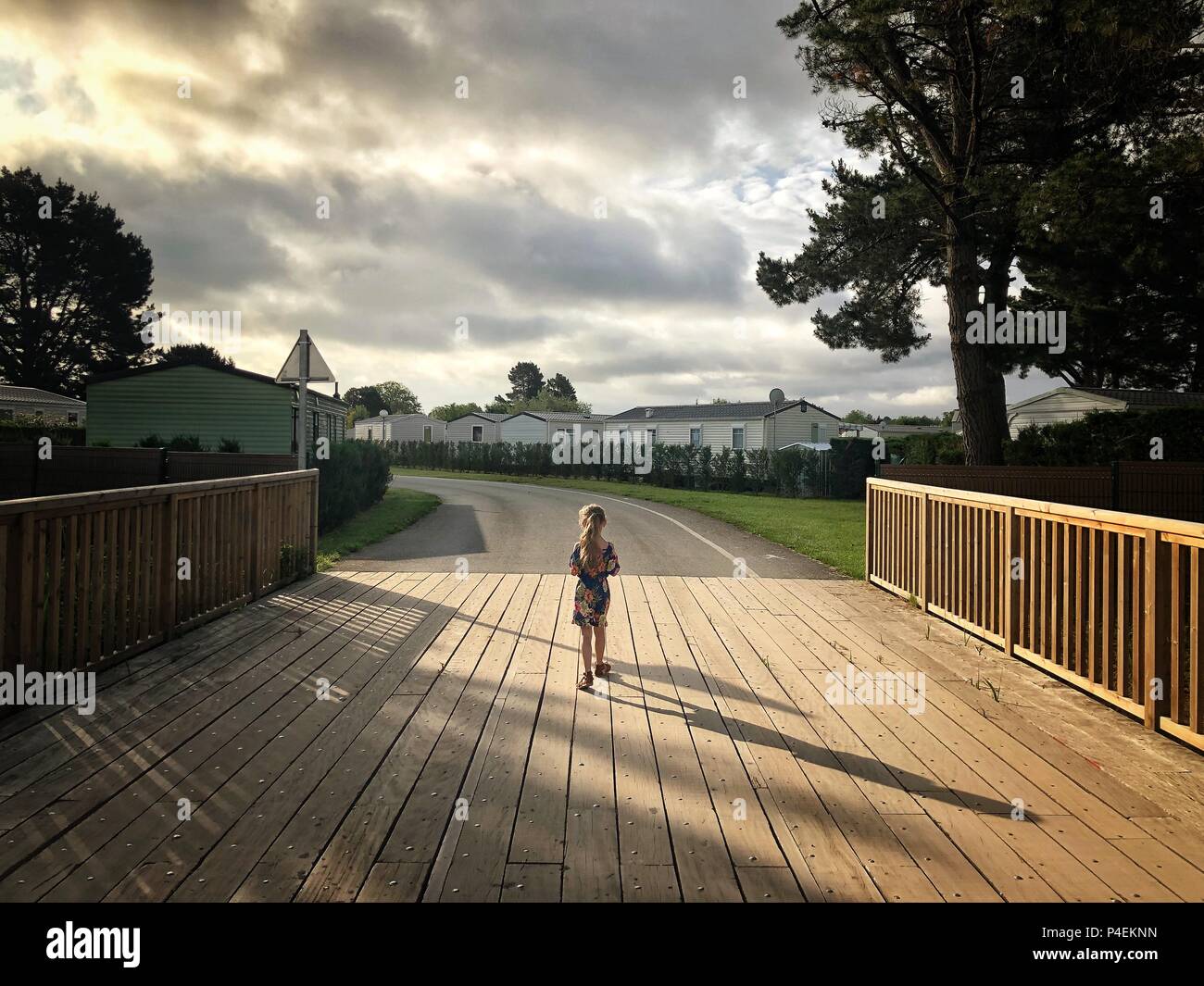 Child crossing bridge hi-res stock photography and images - Alamy