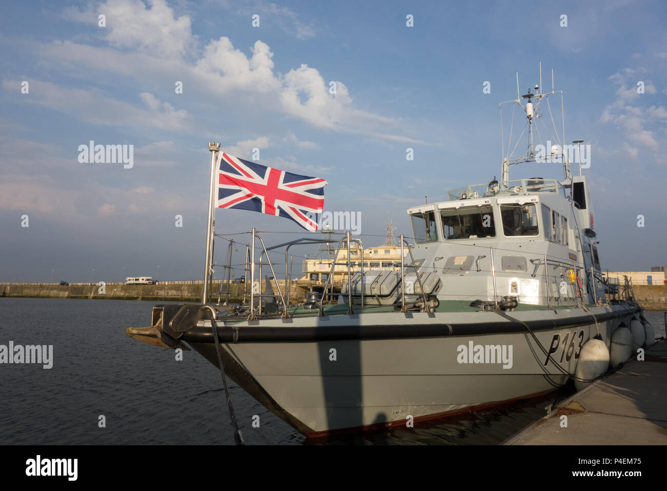Bow view of the Union Jack flying on Archer Class Patrol Vessel HMS Express P163 in Ramsgate, UK Stock Photo