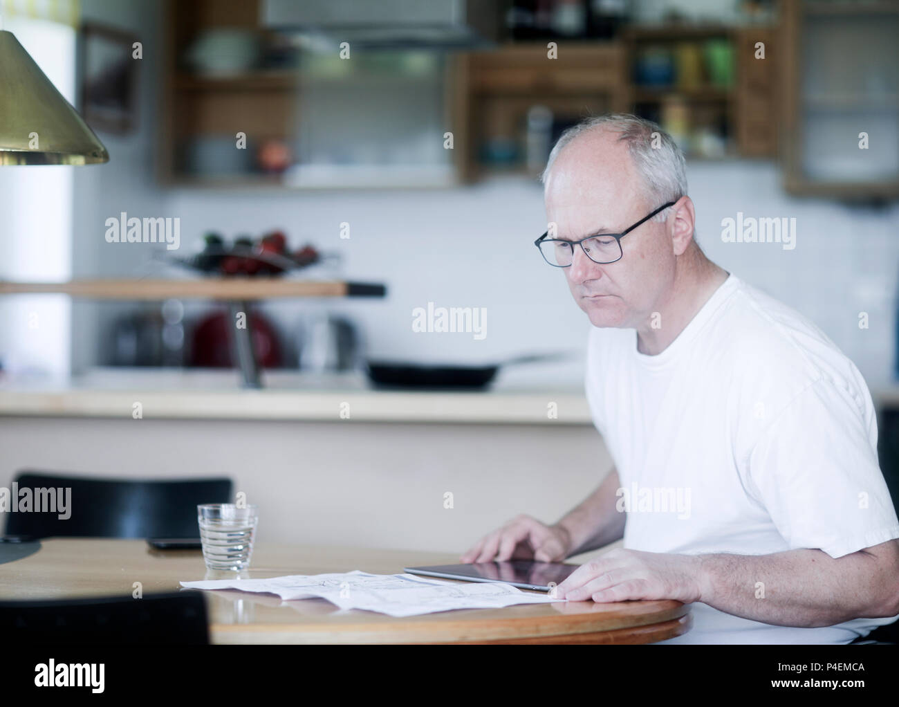 Mature adults sitting table hi-res stock photography and images - Alamy