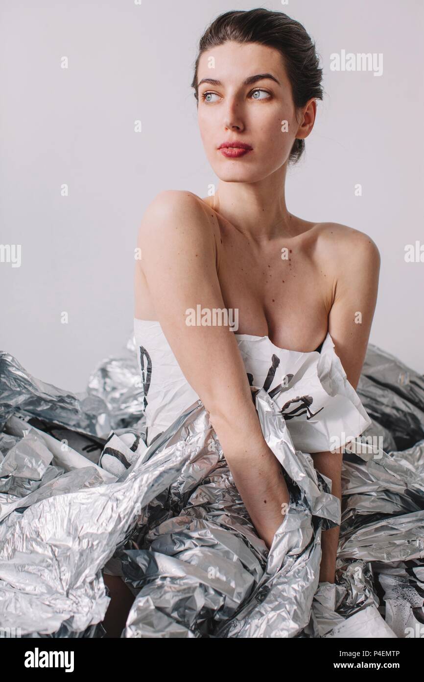 Woman wearing silver dress hi-res stock photography and images - Alamy