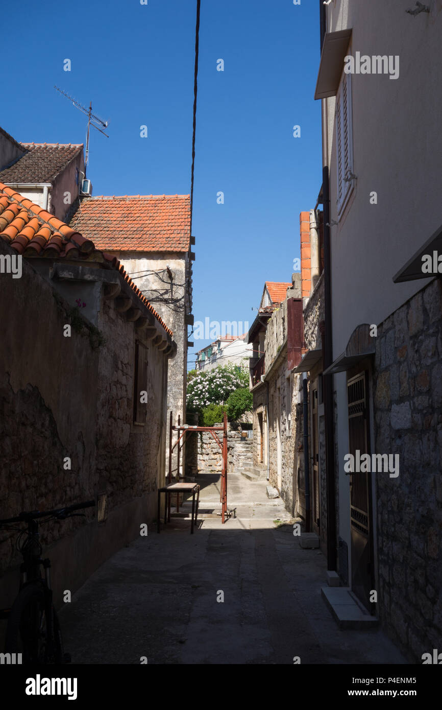 Alleyway inthe backstreets of Milna, Croatia Stock Photo