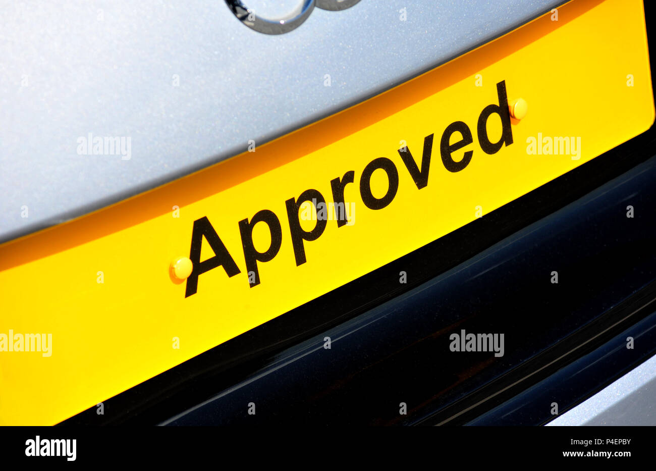 Yellow Approved car plate on an Audi at a dealership in the uk Stock