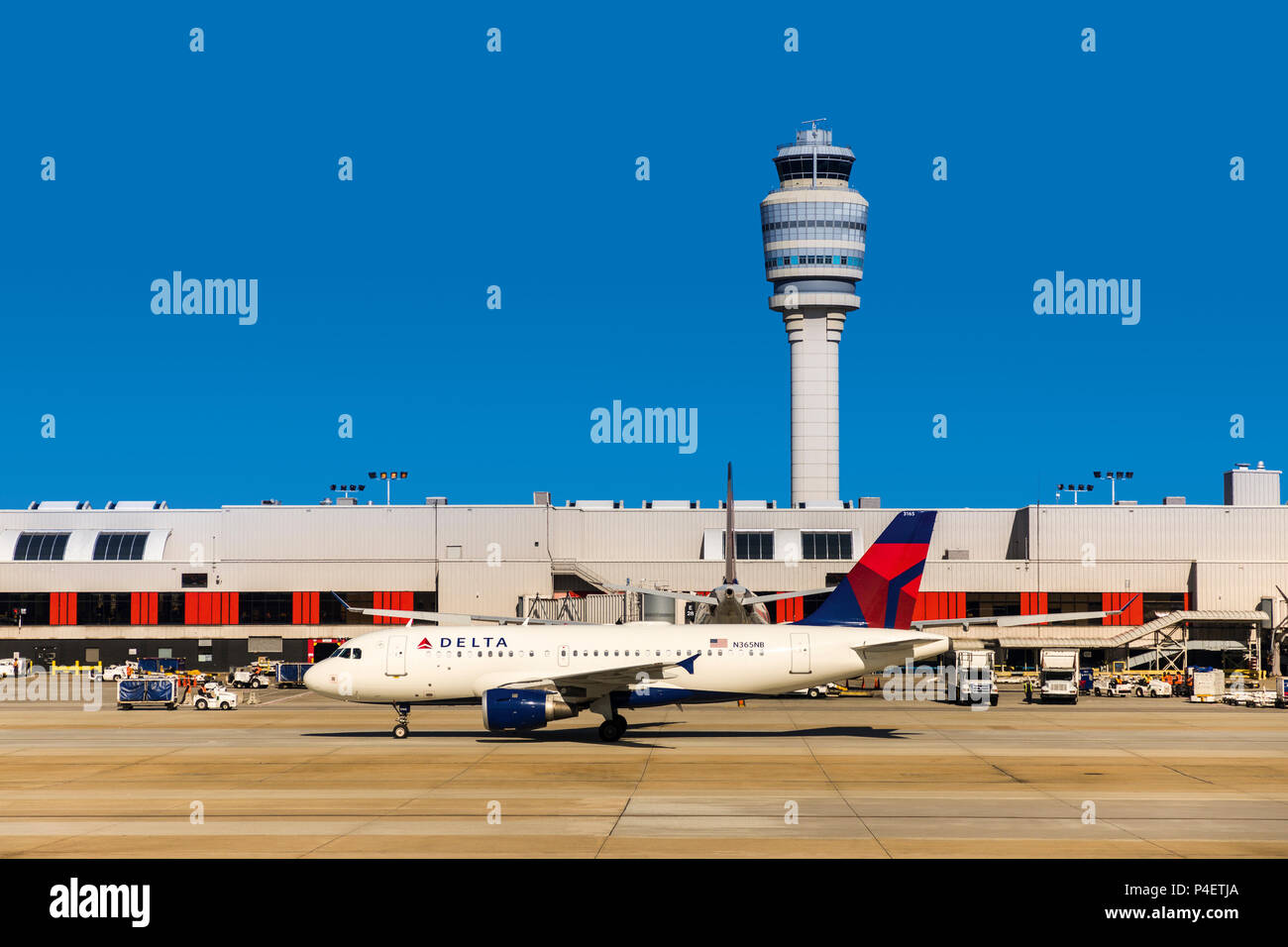 Control tower and Delta aeroplane, airport, Atlanta, Georgia, USA Stock Photo