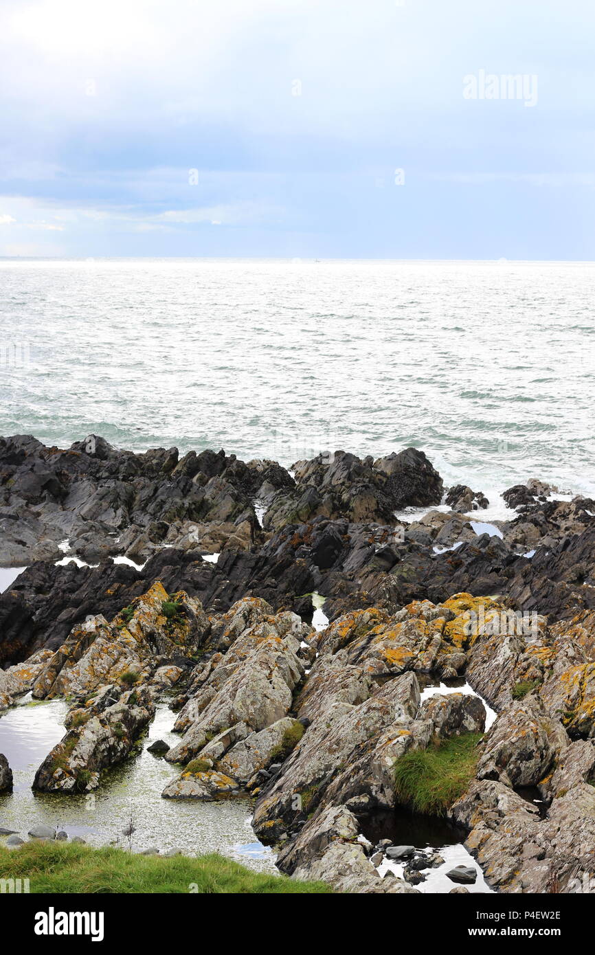 View over the rocks to the Irish Sea from Portpatrick, Scotland Stock Photo