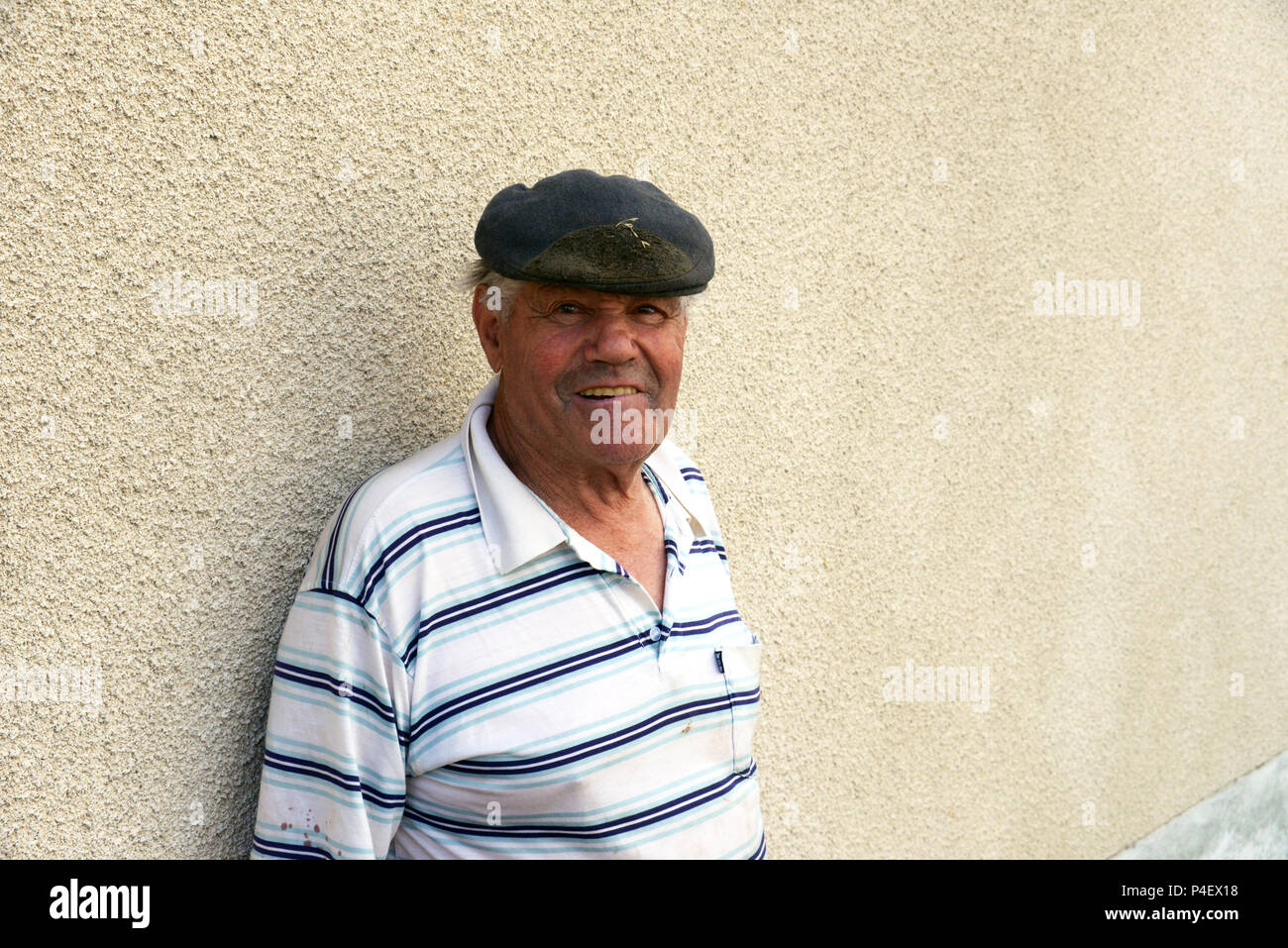 A local village retired man near his home in Roézé-sur-Sarthe, Pays-de-la-Loire in north-western France. Stock Photo