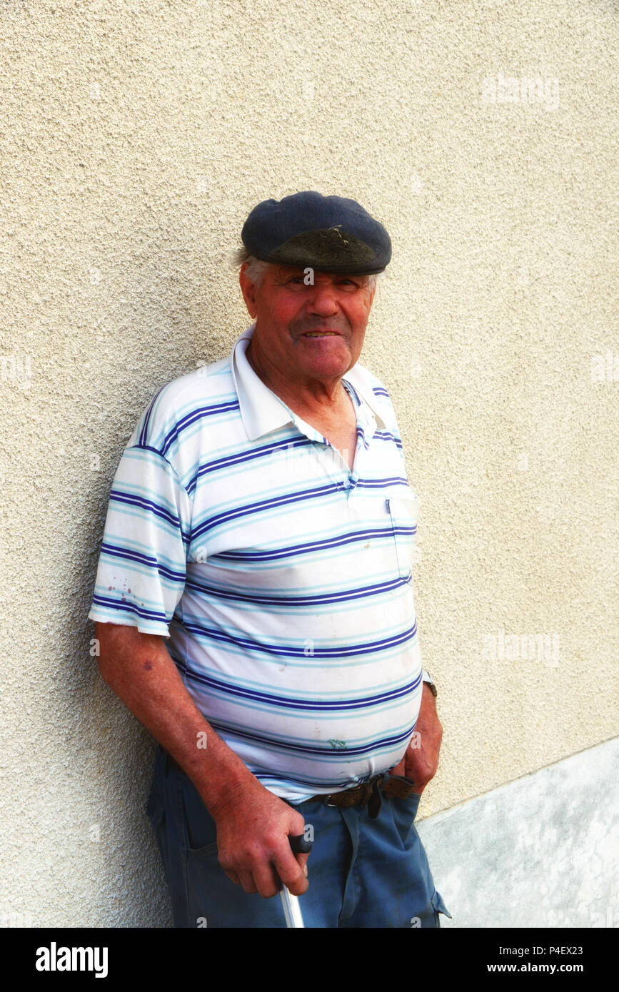 A local village retired man near his home in Roézé-sur-Sarthe, Pays-de-la-Loire in north-western France. Stock Photo