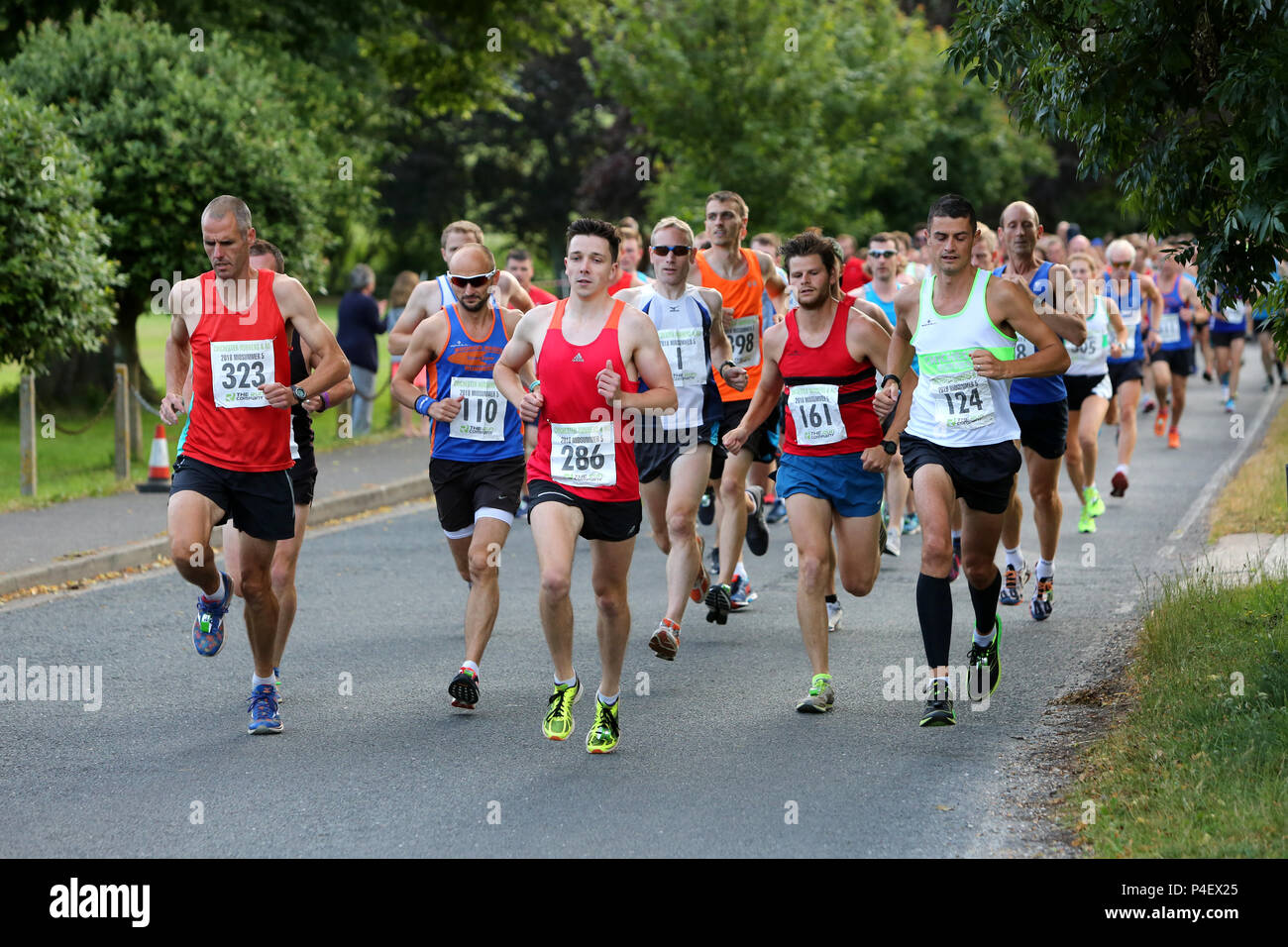 The Chichester Runners Club Mid Summer 5 Road Race which starts in Lavant and runs through Goodwood Racecourse, West Sussex, UK. Stock Photo