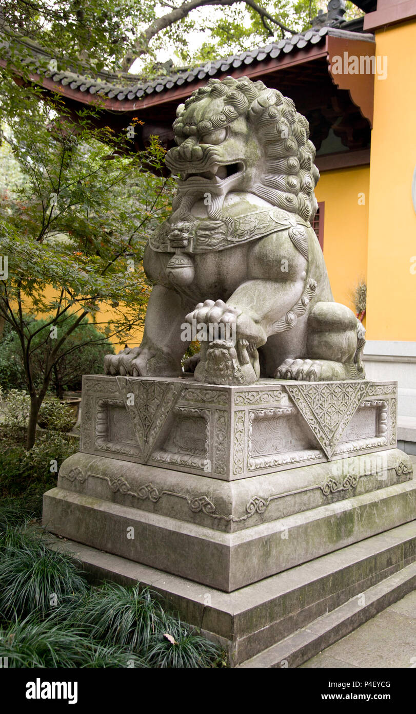 Lion statue in front of Lingyin temple in Hangzhou, China Stock Photo